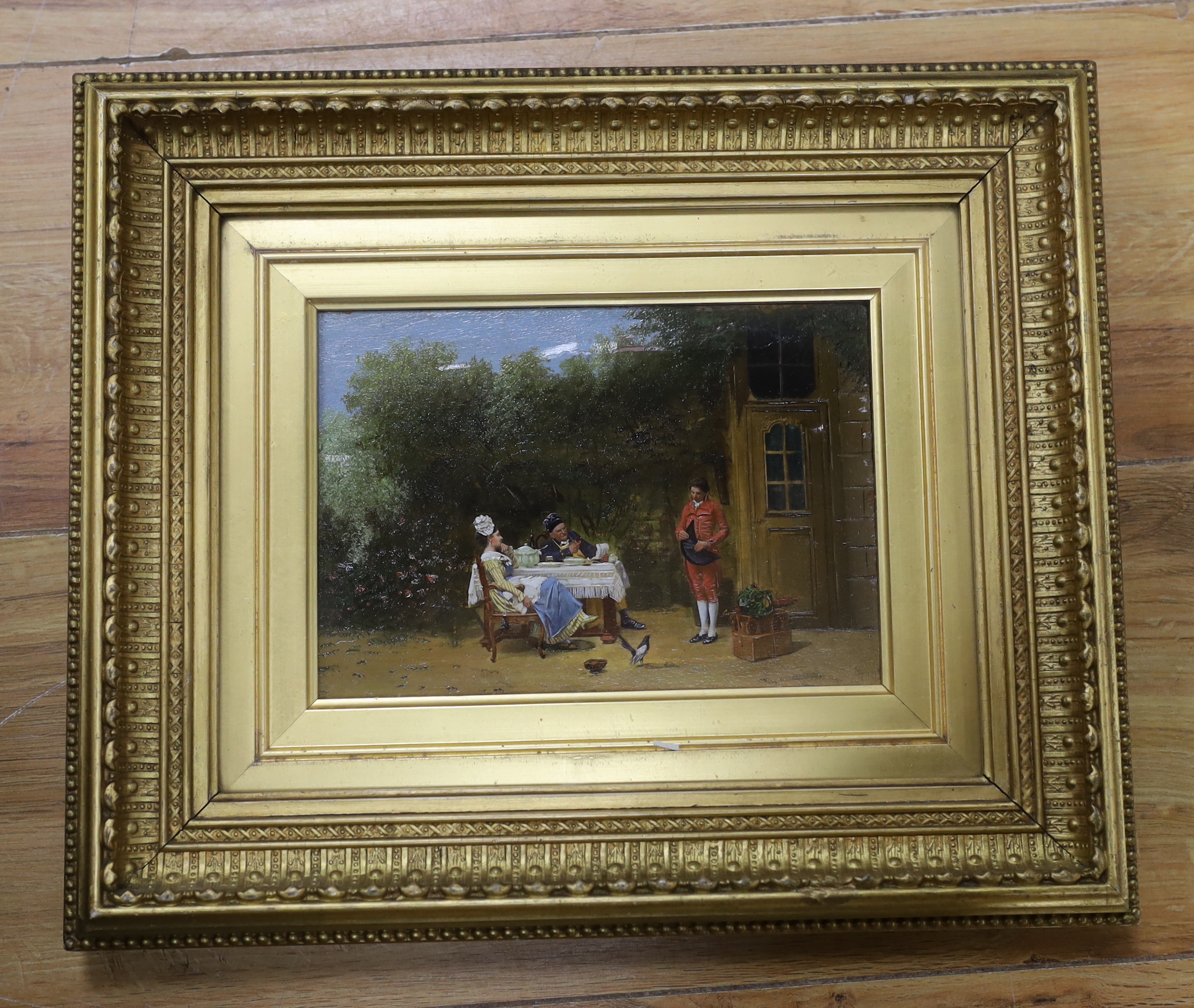Continental School c.1900 (probably French), oil overpainting print on panel, Three figures in a garden, label and indistinct ink inscription verso, 12 x 17cm